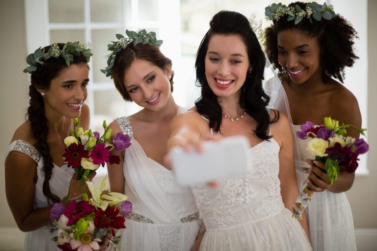 the bridesmaids sharing video testimonials using the toast app