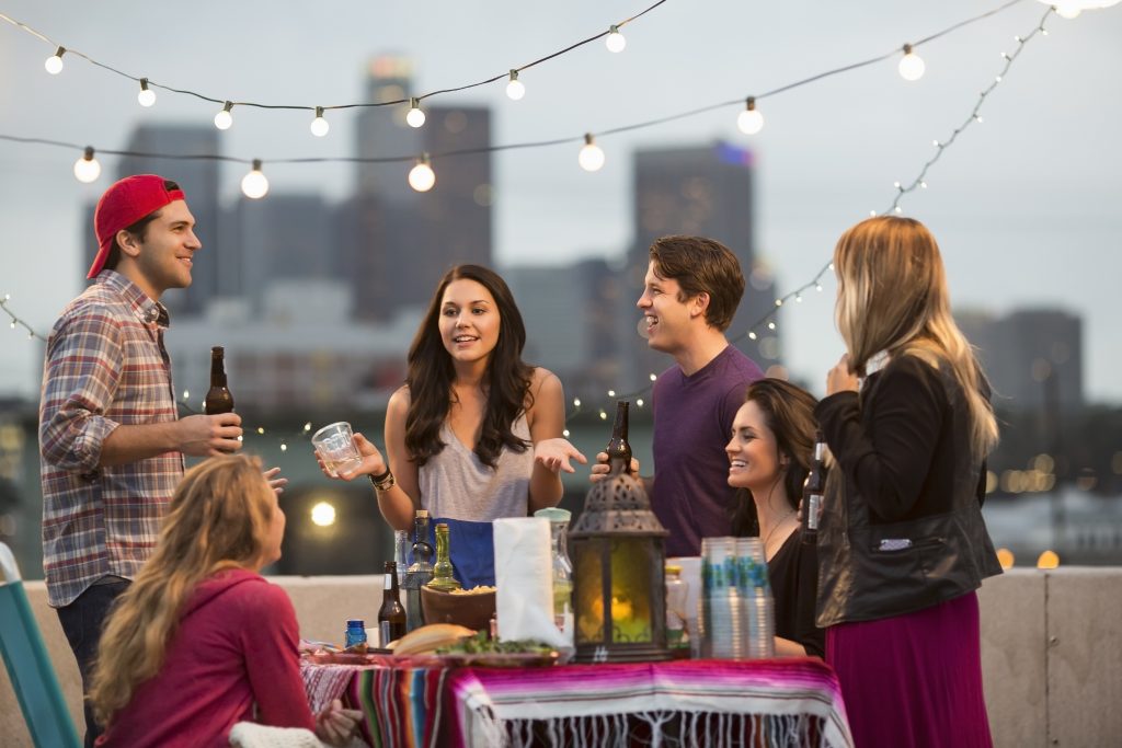 Young adult friends having fun at barbeque