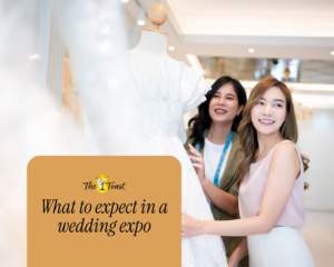 Wedding expo – bride and consultant looking at wedding gown on display mannequin