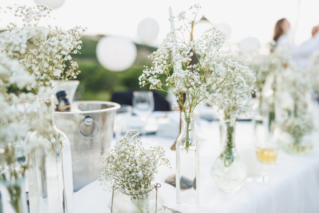 Wedding table decoration with flowers.
