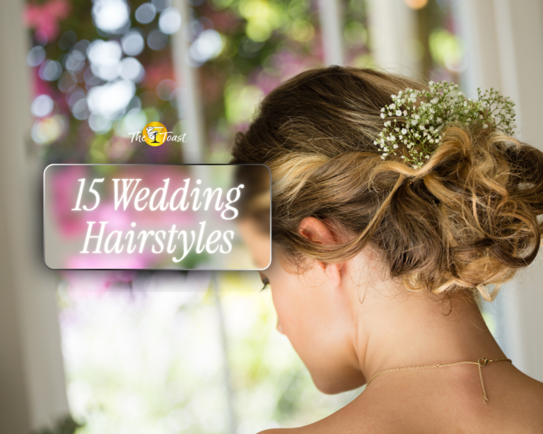 wedding-hairstyles - back view of bride's curly updo with baby's breath flowers near a window