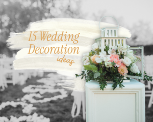 decorating-the-wedding - white lantern with flowers on pedestal beside an outdoor aisle with pink decor